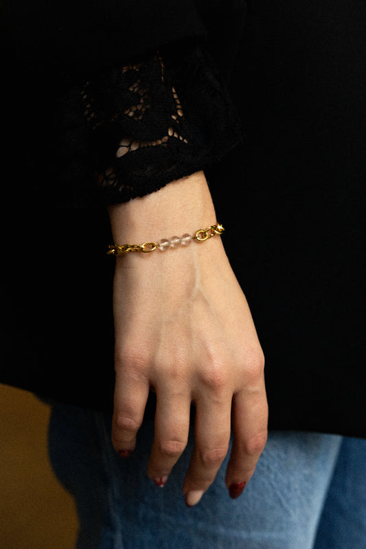 Bracelet Laure en acier inoxydable doré et cristal de roche.
